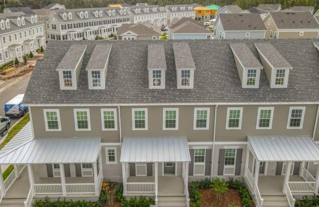 New Luxury Townhome in Celebration, FL Corner unit. All porcelain tiled floors. Aleutian model by Mattamy homes photos photos