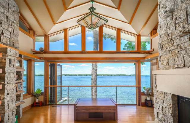 Lake Mendota Dream Home in Desirable Spring Harbor. Stunning Views, Direct Lake Access, and Frank Lloyd Wright-Inspired Design. Fully Furnished. 12 Month Lease. photos photos