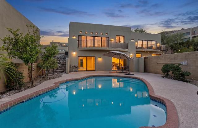 Fully Updated and just Refreshed located in the 10000 North Central Subdivision, hard to get in here!!!  All Tile, Lots of Storage, Gourmet Kitchen!!!  GATED!!!  Mountain Views!!!  Stunner!!! photos photos