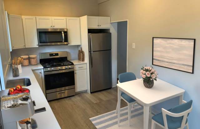 4 Bedroom and 1.5 Bath House with In-Unit Laundry, Dishwasher, and Off-Street Parking photos photos