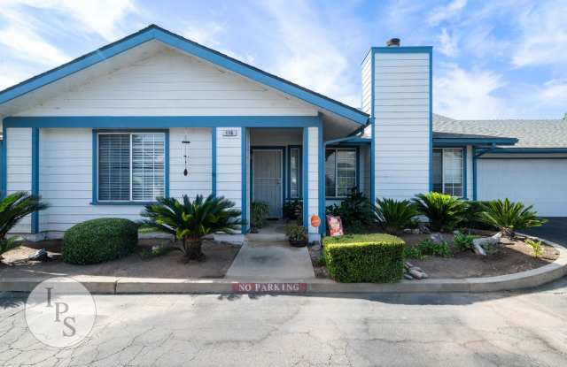 Charming Gated 2-Bed Condo with Attached 2-Car Garage & Water/Garbage Included in Prime Fresno Location photos photos
