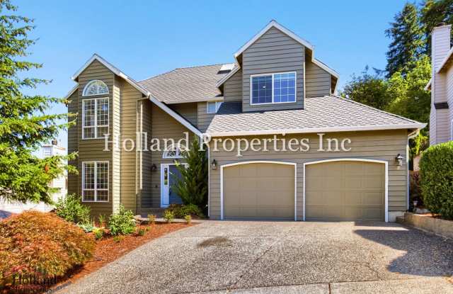 Spacious 4BR Beaverton Home with Fireplace, Fenced Yard & Green Space Views Gallery 3