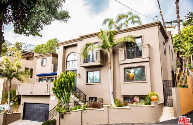 8721 West SUNSET - 8721 West Sunset Boulevard, West Hollywood, CA 90069