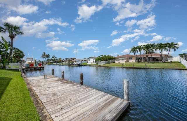 Enjoy the pool or fish/kayak/boat from the dock photos photos