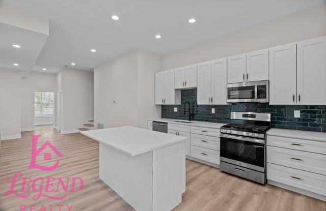 Completely Renovated 4BR Brick Home with 3 Full Baths & Off-Street Parking photos photos