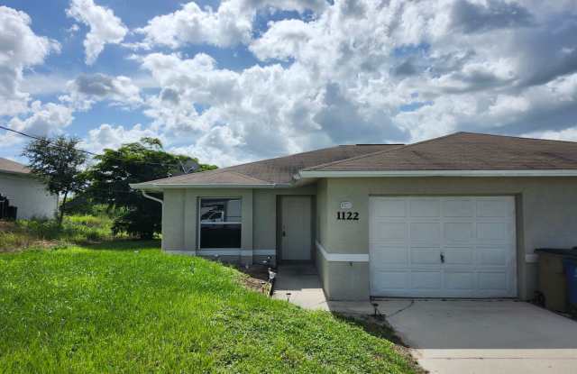3 Bedroom 2 bath 1 car garage - 1122 Harry Avenue South, Lehigh Acres, FL 33973