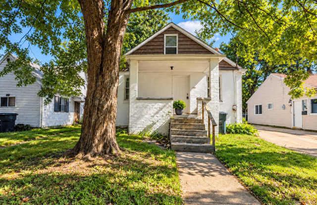 3-Bedroom Akron Home with a Covered Front Porch | Pets Welcome Gallery 1