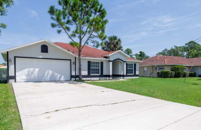 Freshly updated 4 bedroom available for long term rent ! - 4 Princess Ruth Lane, Palm Coast, FL 32164