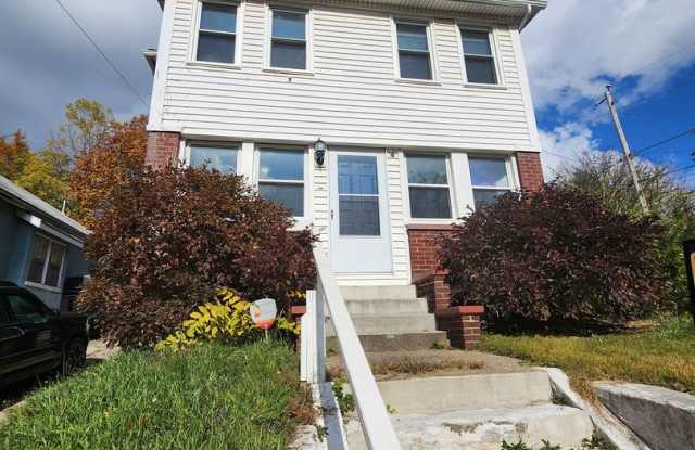 Welcome to 97 E Emerling Ave — a beautifully updated 5-bedroom, 2-bath home in the heart of Akron! photos photos
