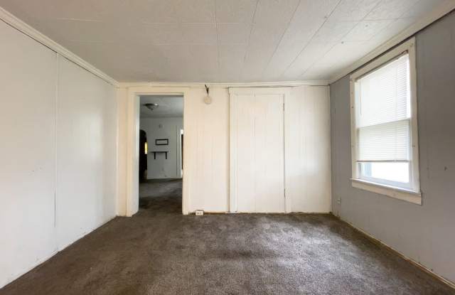 Fall into this cozy 3-Bedroom Home with a fenced in yard  detached garage! photos photos