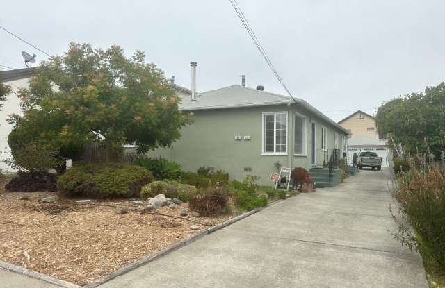 Great natural light on a side by side duplex with parking onsite photos photos