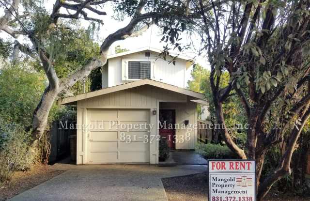 Charming 2-Bed, 1.5-Bath Multi-Level Home with Backyard and Garage! photos photos