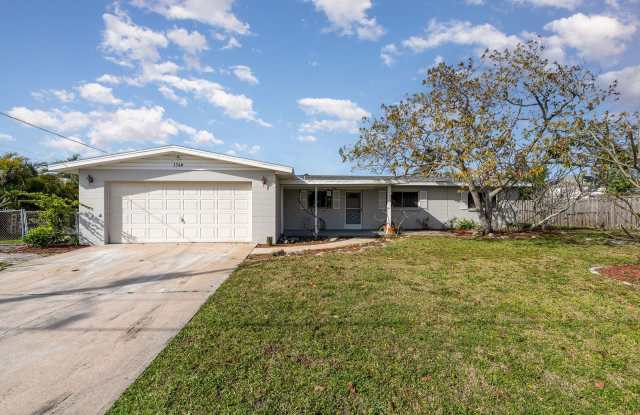 Beautiful canal front home with dock! photos photos