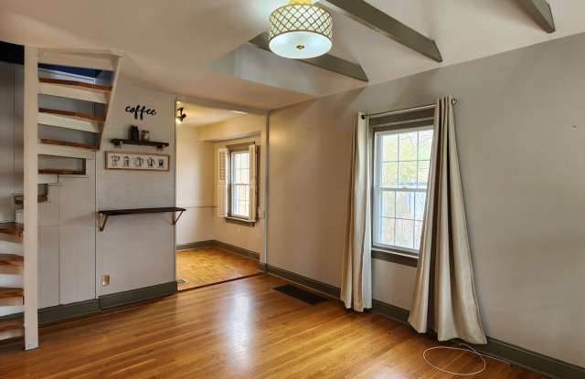 THIS ONE IS NOT LIKE the OTHERS!! ADORABLE, St. Matthews, Cottage Style, 2 Bedrooms, 1 Bath Home with a 2 Car Garage that has been turned into an Entertaining Space with Bar, Taps, TV, Refrigerator  MORE! - 216 Exchange Avenue, St. Matthews, KY 40207