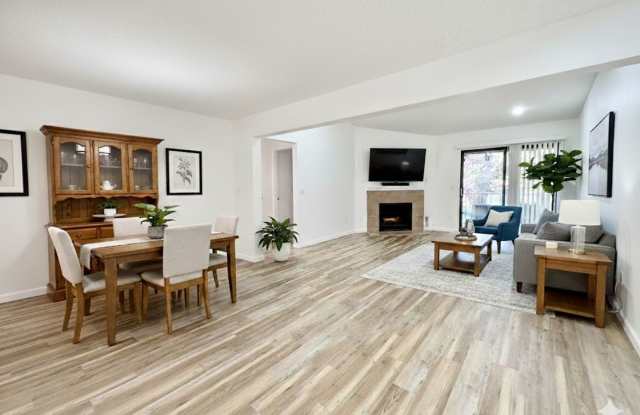 **$500 Off 2nd Month's Rent** Stunning 2 Bedroom Condo with Fireplace, Modern Upgrades and Air Conditioning! Dogs Welcome photos photos