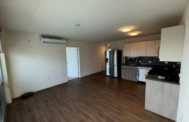 Modern end-unit with ocean views at Kapiolani Residence Gallery 3