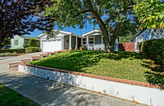 Remodeled, Bright & Airy, Craftsman Bungalow Home on Spacious Corner Lot w/ Charming Front Yard, Private Rear Yard for Indoor/Outdoor Living Just Blocks to Schools, Shopping, MB Village, Mall & Just 1.5 Miles from Beach! photos photos