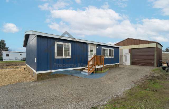 2 Bedroom 1 Bath Home with 24x24 Shop and Off Street Parking Available in Coeur d'Alene! photos photos