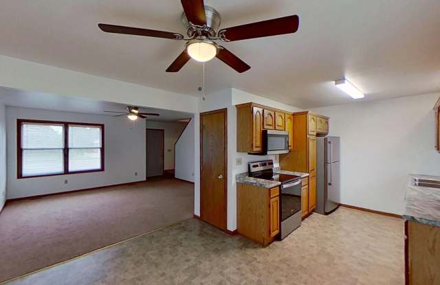 Duplex with two huge bedrooms, walk in closet, 1.5 bath, full basement, lawn and snow removal included. Garage available. Gallery 2