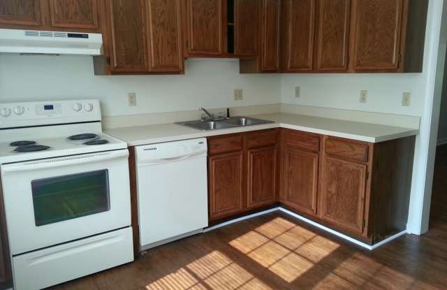 Three Bedroom Townhome, 2.5 bath, with eat-in kitchen, small deck off of living room. photos photos