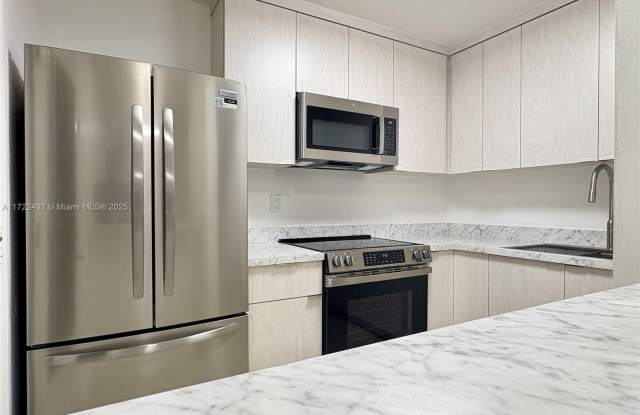 7711 SW 56th St - 7711 Southwest 56th Street, Glenvar Heights, FL 33155