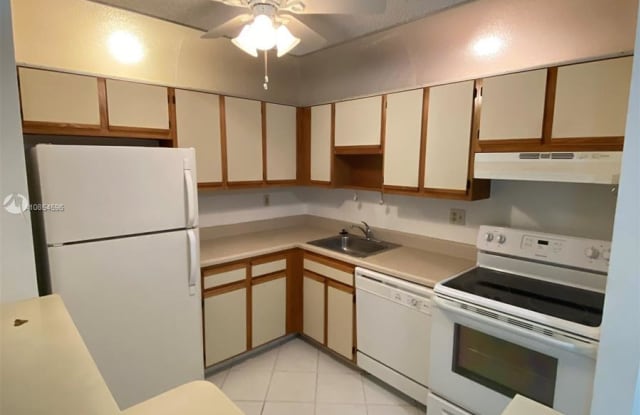 10793 W Clairmont Cir - 10793 West Clairmont Circle, Tamarac, FL 33321