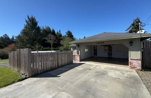 Newley updated 3-bedroom home features fenced yard, garage, and covered patios! photos photos