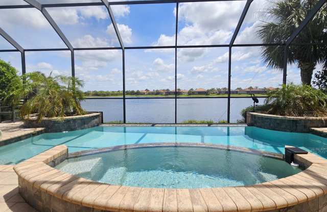 Seasonal Short-Term 4 Bedroom 3 Bathroom Heated Pool Home located in Venetian Golf & River Club! Gallery 3