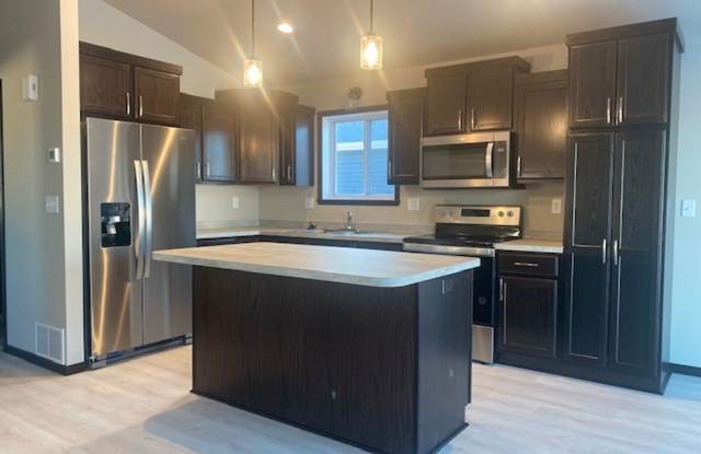 Modern 3 Bedroom Home with Garage  Fenced Yard for Rent! photos photos