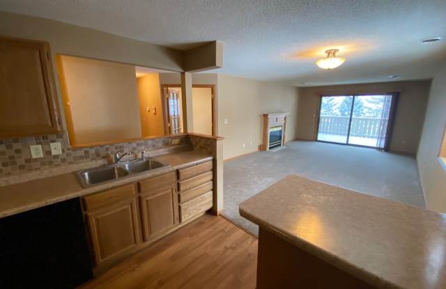 Top Floor Condo Available March 1, Open Floor Plan, Balcony, Fireplace, Walk-in Closet, 2 Baths, Garage Included photos photos
