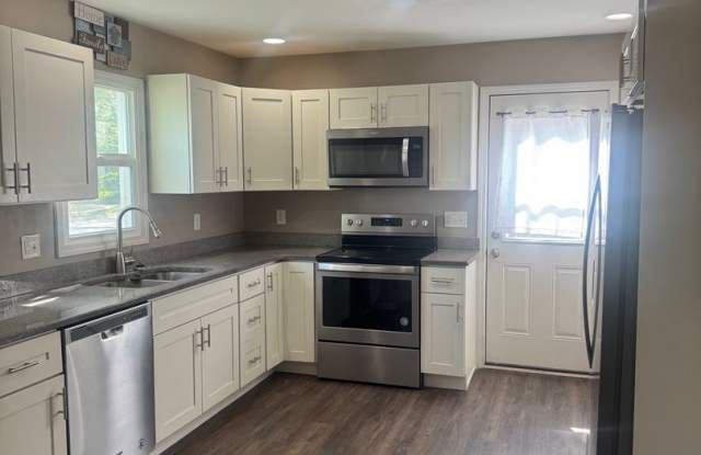 Charming Updated 3BR Home with Large Fenced Yard & Garage Gallery 4