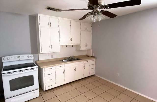 Adorable Remodeled three bedroom, one bath home with spacious fenced in back yard!! photos photos