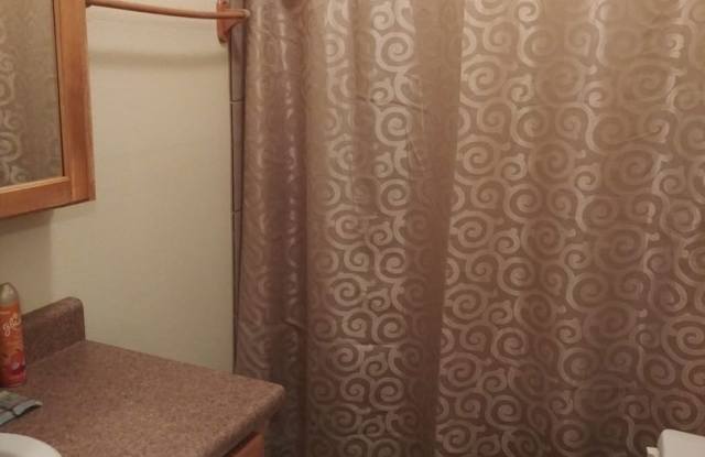 Modern town home with AC. 3/2. Covered, off-street parking, easy care yard.  Ample kitchen. Laminate and tile floors. Gallery 4