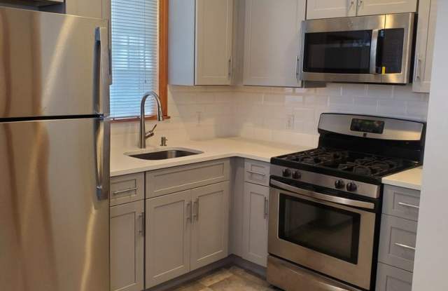 Nicely renovated unit with parking included! photos photos