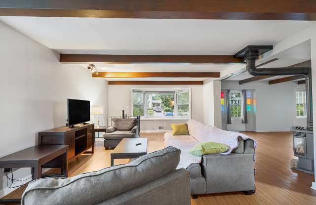 Home-Like Living with Sunroom, Attached Garage & In-Unit Laundry Gallery 3