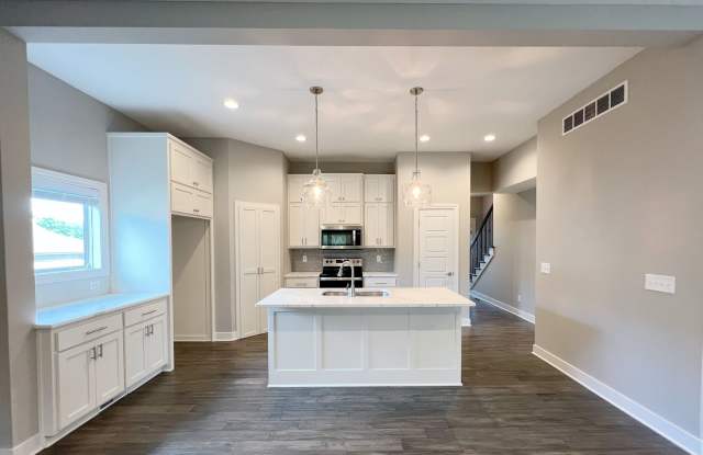 SEE IT NOW: Modern 3-Bedroom Townhome with High-End Finishes! - 31725 West 83rd Court, De Soto, KS 66018