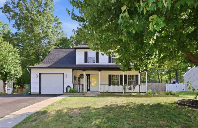 Charming Craftsman-style beauty built in 2022 offering the perfect blend of modern comfort, thoughtful design, and everyday convenience! photos photos