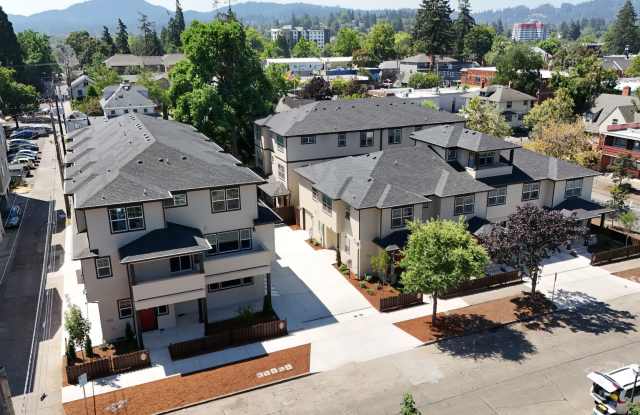 4 Bedroom / 4 bath New Townhome. Every bedroom is its own Master Suite with your own full bathroom, walk in closet and A/C unit. Full-size washer and dryer in your unit. Gallery 4