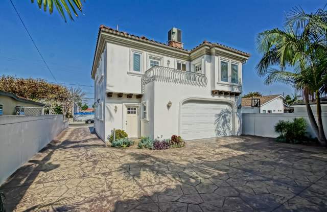 SPACIOUS & BRIGHT, TWO-STORY HOME W/ FRONT YARD, BALCONY & 2-CAR GARAGE CLOSE TO SHOPPING, FREEWAY ACCESS, RB BORDER & MINS TO BEACH! photos photos