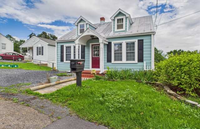 Welcome to 109 Skyline Avenue, a charming two-bedroom cottage photos photos