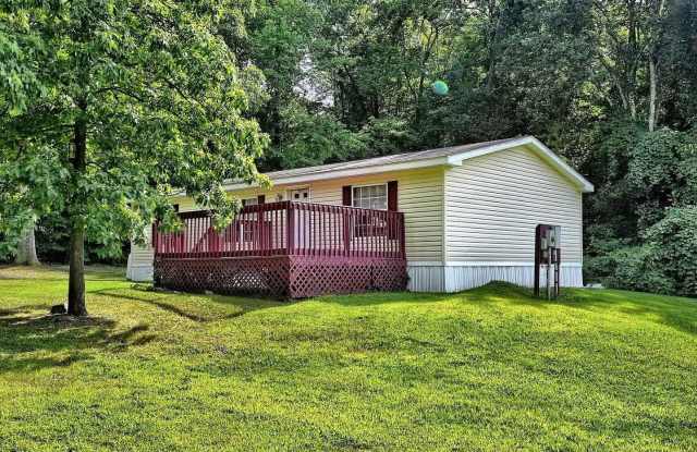 3 Bed, 2 Bath Home with Decks on a Private Lot in Modena Gallery 4