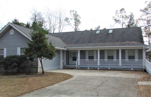 This property is located in Carolina Shores - 3 bedrooms, 2 bathrooms completely furnished or it can be unfurnished with a 2 car garage photos photos