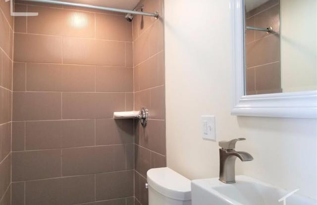 Nicely renovated 4 bed unit near the Commuter Rail! Gallery 4