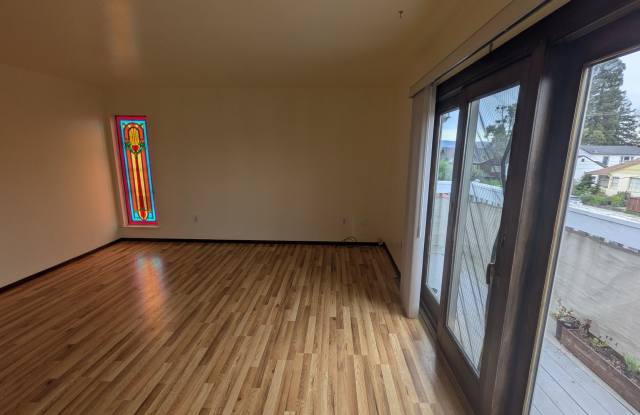 Bright Upstairs Studio with Deck  Peek of the Ocean | Utilities Included photos photos