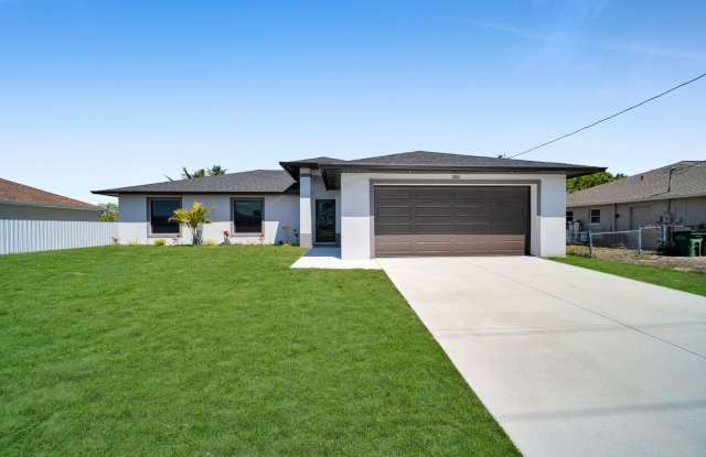 Be the first in occupy this 2026 constructed home in the vibrant city of Cape Coral, FL! Qualify for a deposit-free option and save on move-in costs! photos photos