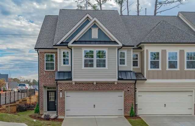 Welcome to this stunning 3-bedroom, 2.5-bathroom end-unit townhouse located in the vibrant city of Raleigh, NC. photos photos