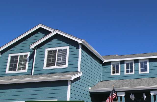 Beautiful 3 bedroom home that includes a finished basement with two car garage! photos photos