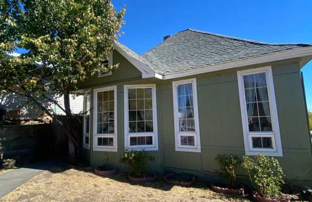 2 bedroom, 1 bathroom house, fenced yard, above downtown Gallery 1