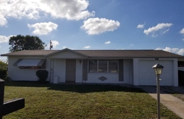 1414 Juddale St E - 1414 Juddale Street, Lehigh Acres, FL 33936