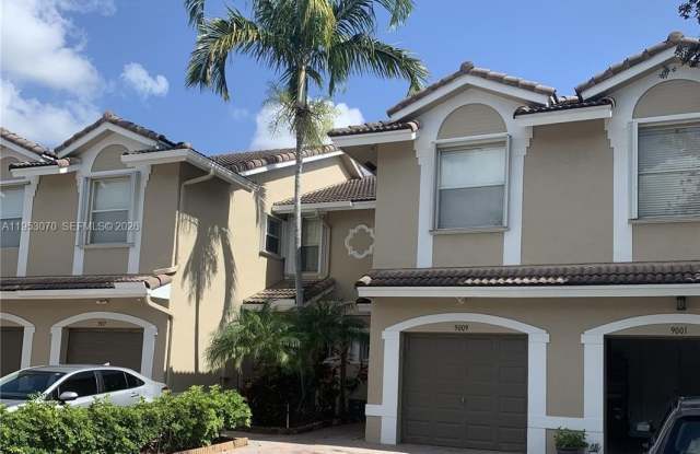 9009 NW 54th St photos photos